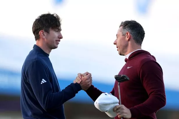 Photo shows Tom McKibbin and Rory McIlroy