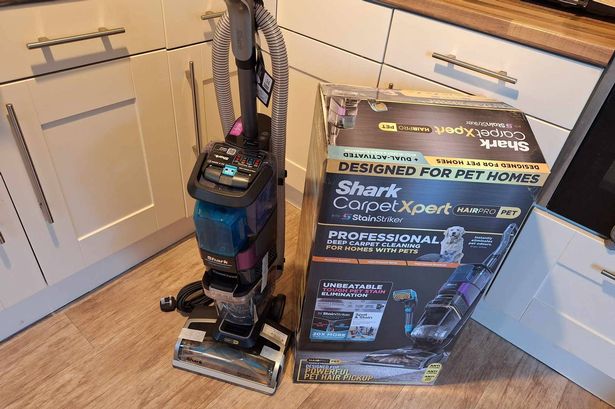 Shark's new carpet cleaner pictured next to the box it comes in