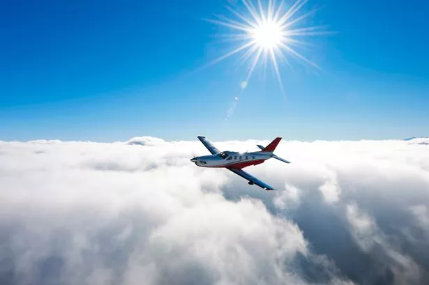 A Turbo Propeller Plane at High Altitude.