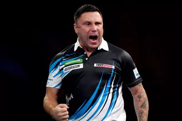 Gerwyn Price celebrates during his third round match against Joe Cullen