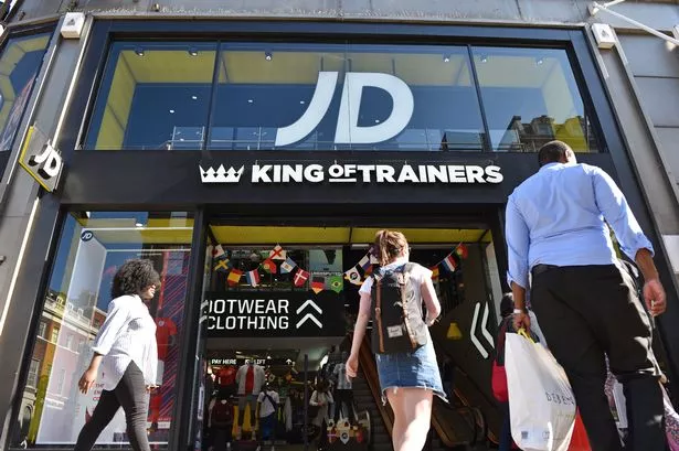 An image of shoppers outside a JD Sports