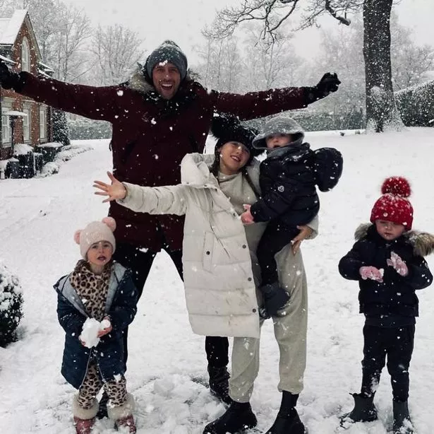 The Crouch and Clancy family enjoying the snow