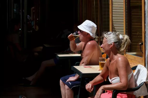 Couple enjoy a pint