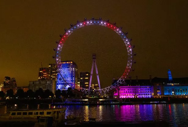 London Eye illuminated in Red, White and Blue for Pride of Britain