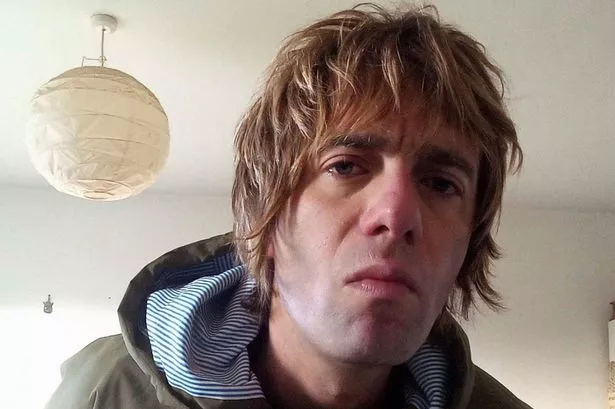 Liam Gallagher look-a-like barman 