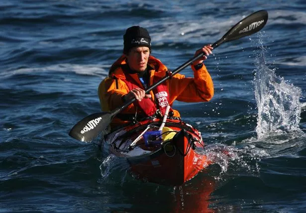 Andrew McAuleyin a kayak training off Terrigal