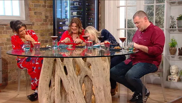 Sara Pascoe at table with guests on Saturday Morning 