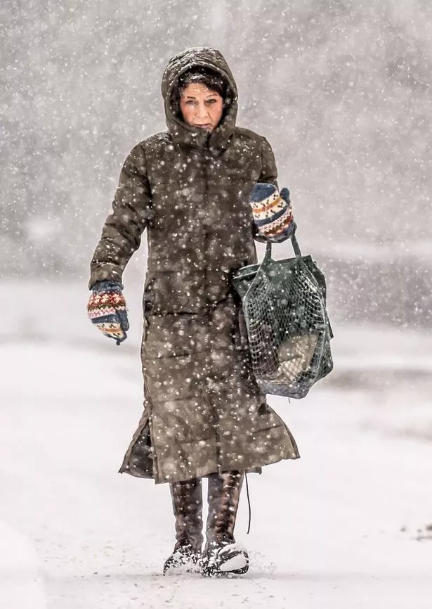 woman walking in snow