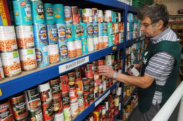 Storing donations at a Woking food bank, The Lighthouse, in November 2018