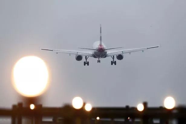 A plane landing at Gatwick Airport