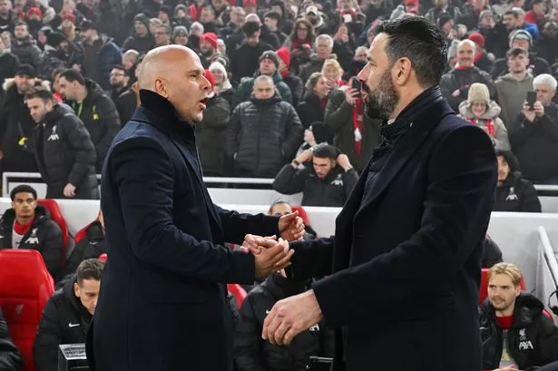 LIVERPOOL, ENGLAND - DECEMBER 26: (THE SUN OUT, THE SUN ON SUNDAY OUT) Liverpool) Arne Slot, Manager of Liverpool, shakes hands with Ruud van Nistelrooy, Manager of Leicester City, prior to the Premier League match between Liverpool FC and Leicester City FC at Anfield on December 26, 2024 in Liverpool, England. (Photo by Liverpool FC/Liverpool FC via Getty Images)