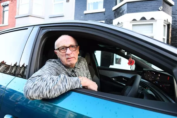 Joseph Ely can't charge his electric car outside his Anfield home