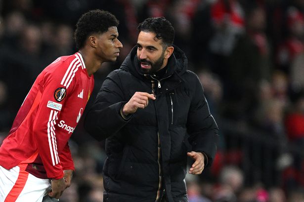 Marcus Rashford receives instructions from Ruben Amorim.