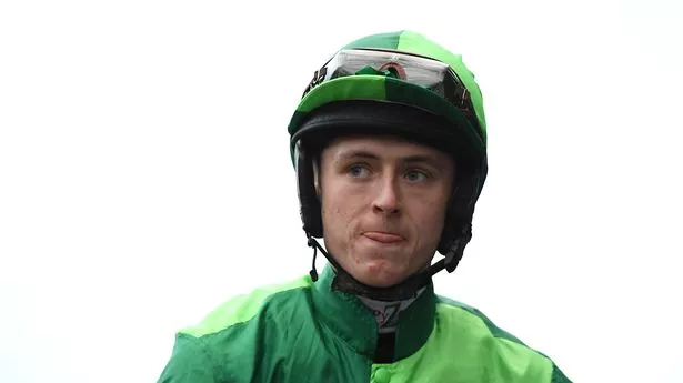 Jockey Niall Houlihan: became trapped under his horse at Fakenham