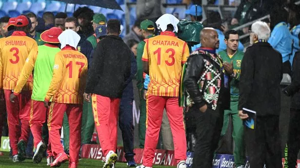 Players shake hands after the match