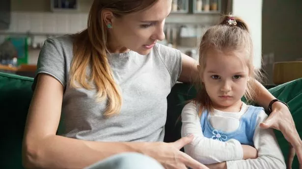 Angry offended little girl ignoring not listening mother words,