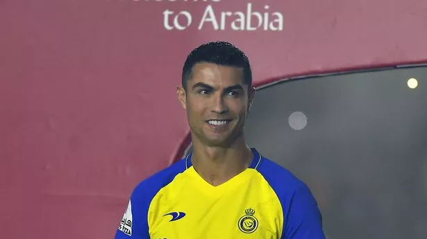 Cristiano Ronaldo poses after making the move to Al-Nassr