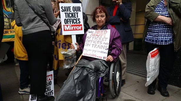 Members and supporters of the RMT Union pictured at a protest calling for the rail ticket offices to stay open