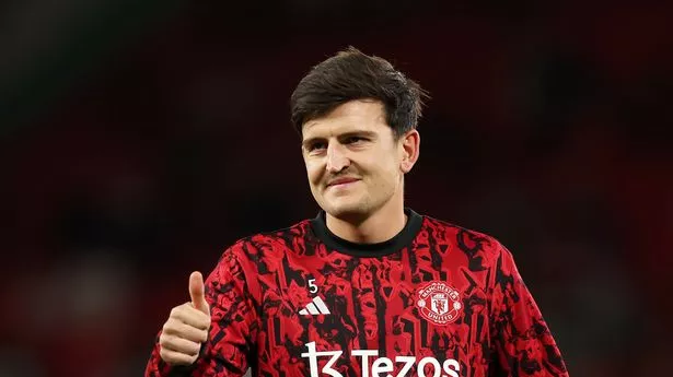 MANCHESTER, ENGLAND - SEPTEMBER 26: Harry Maguire of Manchester United acknowledges the fans in the warm up prior to the Carabao Cup Third Round match between Manchester United and Crystal Palace at Old Trafford on September 26, 2023 in Manchester, England. (Photo by Matt McNulty/Getty Images)