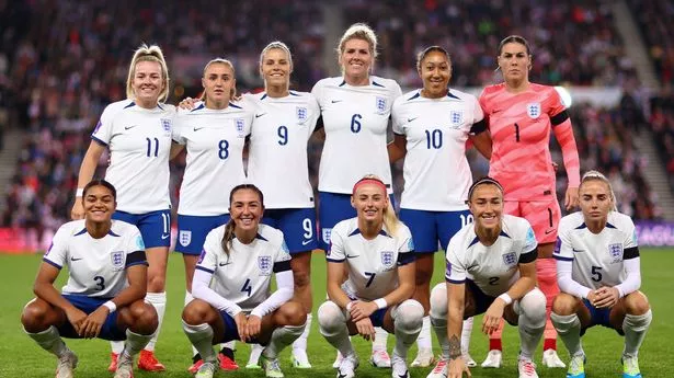 Players of England line up for a team photo prior to the UEFA Women's Nations League match between England and Scotland