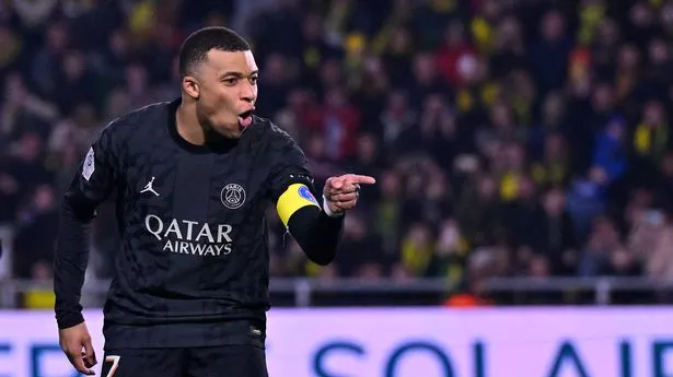 Kylian Mbappe reacts after scoring during the Ligue 1 Uber Eats match between FC Nantes and Paris Saint-Germain