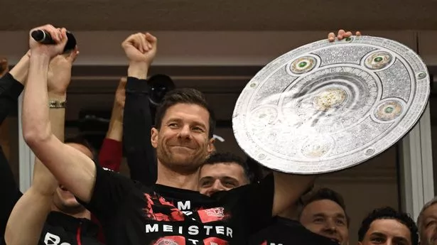 Xabi Alonso celebrates Bayer Leverkusen's Bundesliga triumph