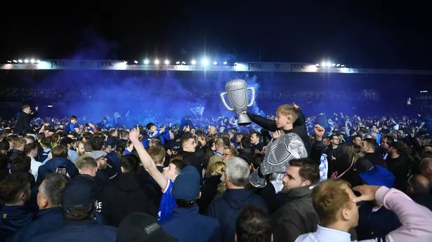 PORTSMOUTH, ENGLAND - APRIL 16: A general view as Portsmouth fans celebrates becoming Champions of League One during the Sky Bet League One match between Portsmouth and Barnsley at Fratton Park on April 16, 2024 in Portsmouth, England. (Photo by Alex Davidson/Getty Images) (Photo by Alex Davidson/Getty Images)