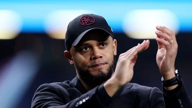 BURNLEY, ENGLAND - APRIL 02: Vincent Kompany, Manager of Burnley, applauds the fans after the draw during the Premier League match between Burnley FC and Wolverhampton Wanderers at Turf Moor on April 02, 2024 in Burnley, England. (Photo by Alex Livesey/Getty Images)