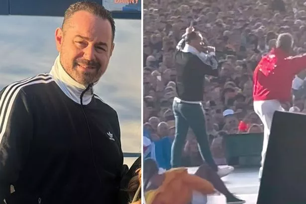 Danny Dyer joins Robbie Williams on stage