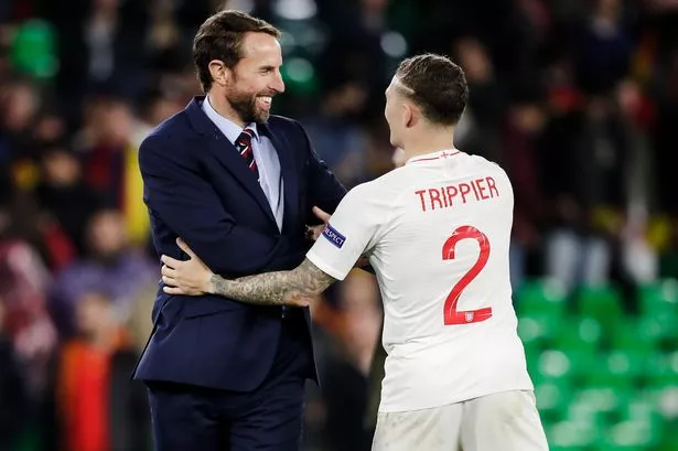 Gareth Southgate with Kieran Trippier after England defeated Spain in 2018.