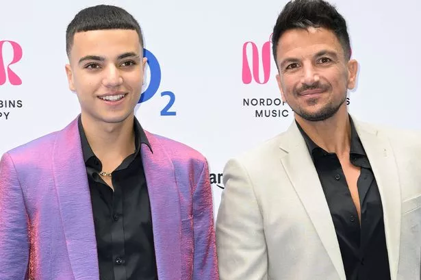 Peter Andre was kicked off stage by his 19-year-old son Junior, who belted out his own song to the 90s festival crowd in Manchester