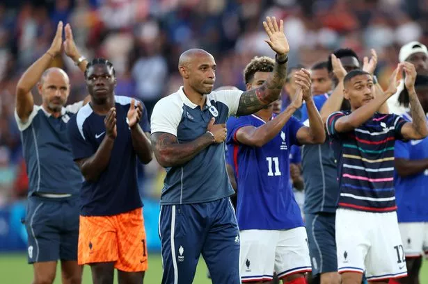 Thierry Henry, Head Coach of Team France and his players acknowledge the fans 