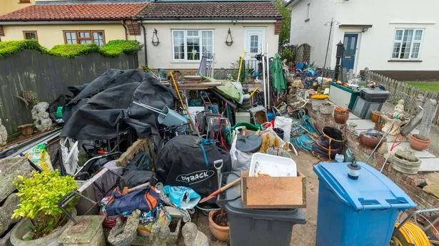 The mess includes an array of items, including metal, bikes and even a wheelbarrow