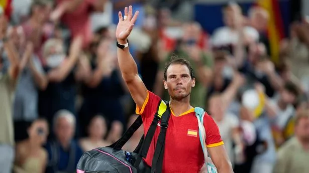 Rafael Nadal of Spain waves to the crowd after losing in the Men's Double Quarterfinal on day five of the Olympic Games Paris 2024 at Roland Garros on July 31, 2024 in Paris, France.