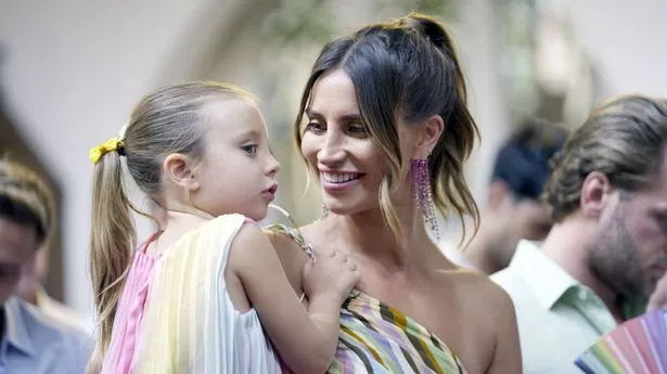 Ferne McCann smiles with daughter Sunday