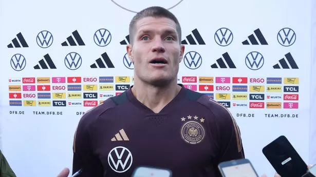 FOXBOROUGH, MASSACHUSETTS - OCTOBER 11: Kevin Behrens speaks to the media during a Germany mixed zone opportunity at Renaissance Boston Patriot Place hotel on October 11, 2023 in Foxborough, Massachusetts. (Photo by Alex Grimm/Getty Images)