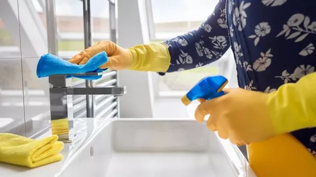 Cleaning sink and faucet with antibacterial detergent