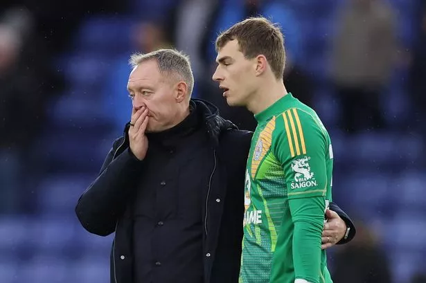 Steve Cooper of Leicester City with Mads Hermansen after the Premier League match between Leicester City FC and Chelsea