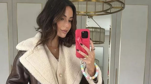 Michelle Keegan taking a mirror selfie