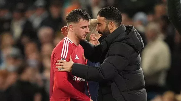 Mason Mount (left) is embraced by manager Ruben Amorim