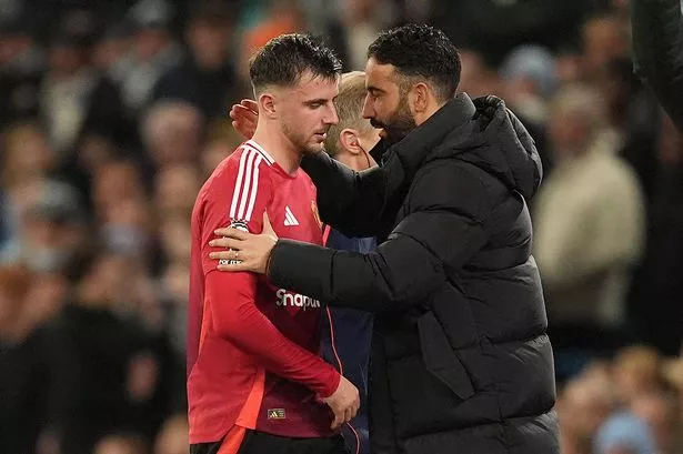 Mason Mount (left) is embraced by manager Ruben Amorim