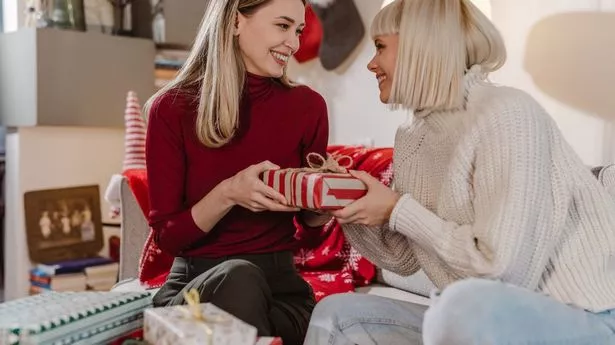 Women exchanging gifts