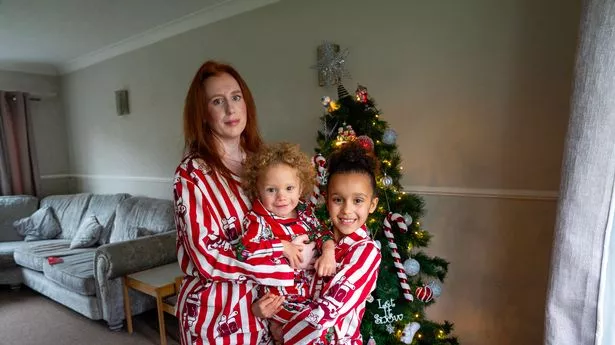 Emma Hayes with her son Reuben and daughter Kimaarah pictured at home in Harlow, Essex