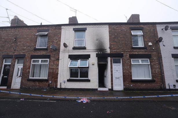 The scene of a fire in one of two houses on York Street in Garston