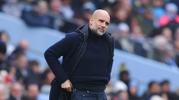 Pep Guardiola looks dejected during the Premier League match between Manchester City FC and Everton FC