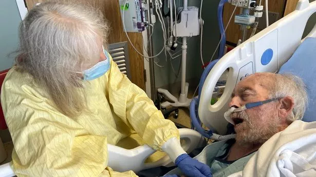 Alan Forster with his wife Dianna in hospital