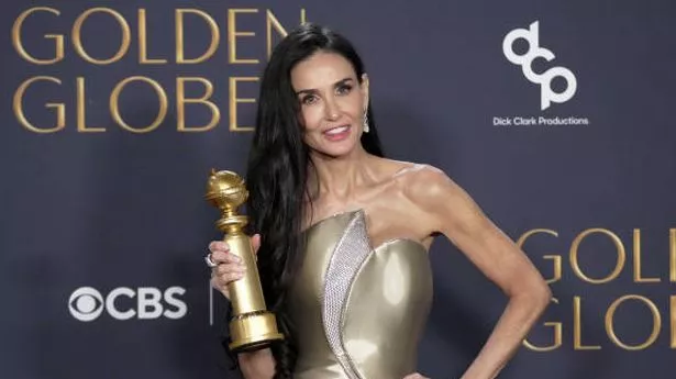 Demi Moore, winner of the Female Actor in a Motion Picture Musical or Comedy Award for "The Substance" poses in the press room at the 82nd Annual Golden Globe Awards at The Beverly Hilton on January 05, 2025 in Beverly Hills, California