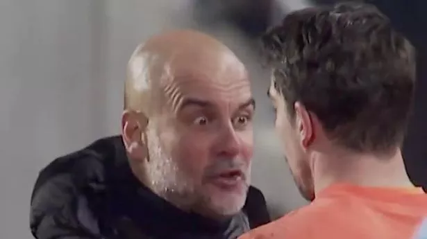 Pep Guardiola and Stefan Ortega