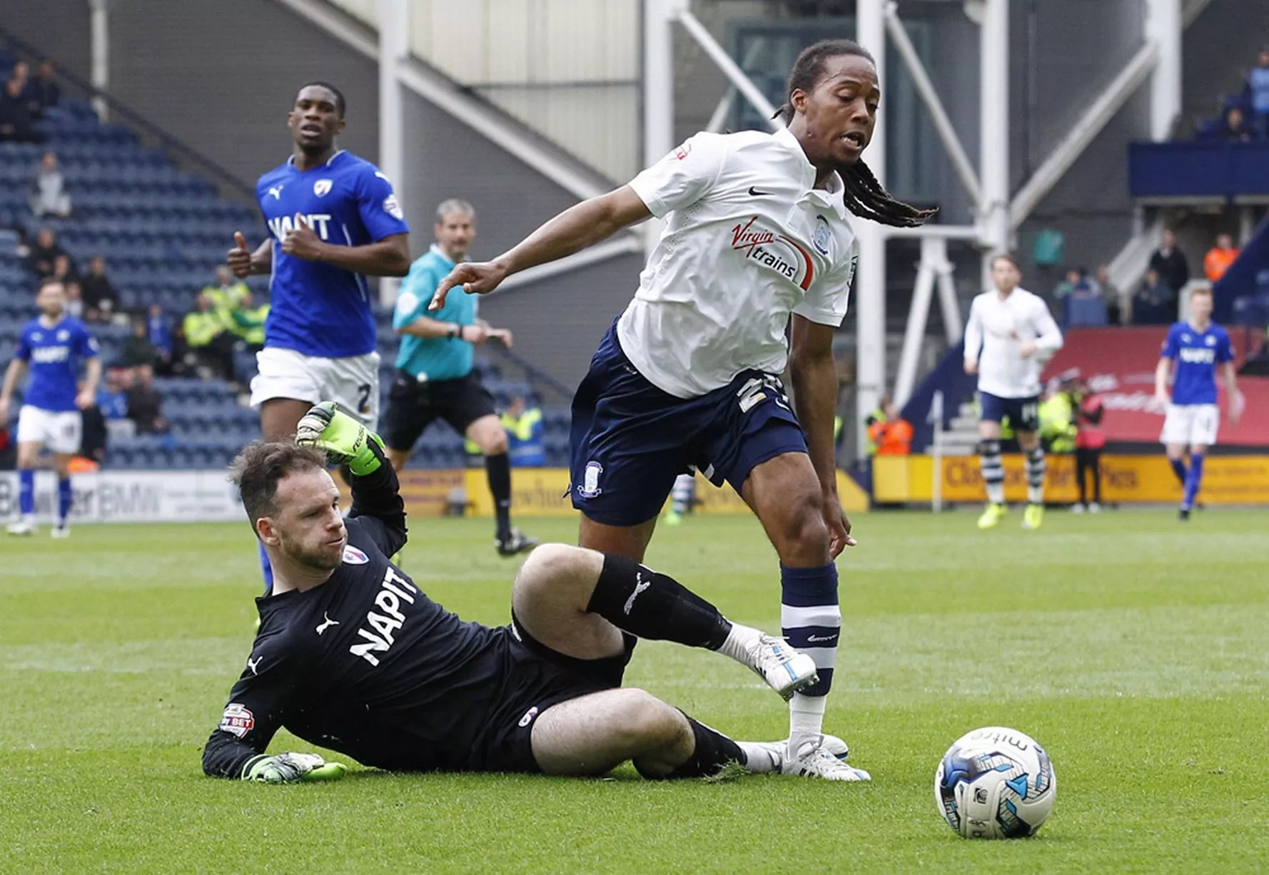 Chesterfield's Joe Murphy concedes a penalty against Preston North End's Daniel Johnson