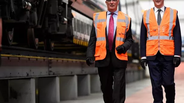 Chancellor George Osborne and former Chancellor Alistair Darling